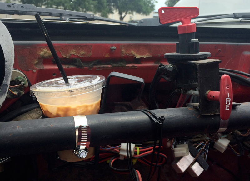 Illustration for article titled Putting A Cupholder In My Race Car Is The Best Decision I've Ever Made